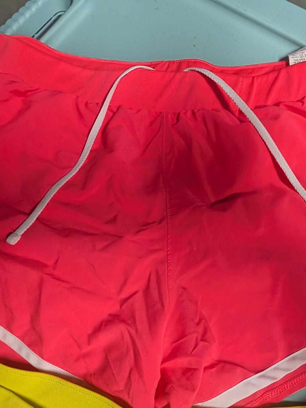 Under Armour Bright Pink Running Shorts with White Drawstring
